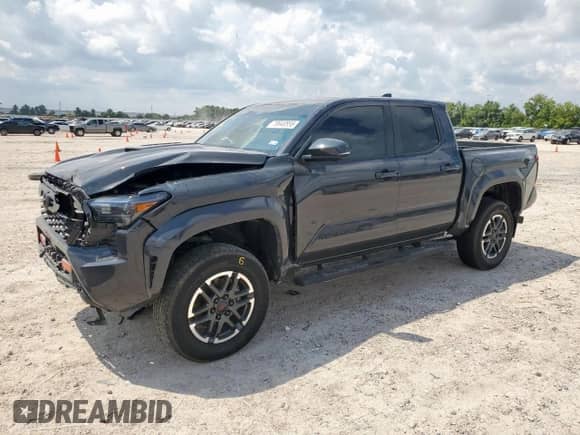 2024 Toyota Tacoma SR5 with VIN 3TMLB5JN1RM024042, listed as a Copart auction lot 70640855 with 23,853 mi miles and Salvage title. Bid and sale history available at DreamBid. Image 1.