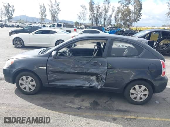 2010 Hyundai Accent GS z VIN KMHCM3AC3AU180348, wystawiony jako IAAI lot #41735911 z przebiegiem 151 946 mil mil oraz . Historia ofert i sprzedaży dostępna na DreamBid. Obrazek 14.