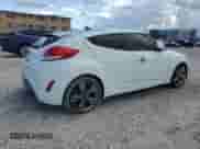 2014 Hyundai Veloster z VIN KMHTC6AD4EU194875, wystawiony jako Copart lot #84427235 z przebiegiem 127 813 mil mil oraz Szkoda całkowita • Salvage title. Historia ofert i sprzedaży dostępna na DreamBid. Obrazek 3.