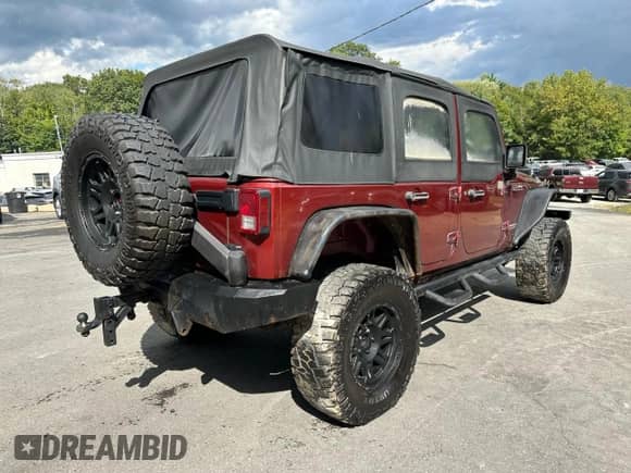 2008 Jeep Wrangler Unlimited Rubicon with VIN 1J8GA69198L599929, listed as a Copart auction lot 71301415 with 234,168 mi miles and Clean title. Bid and sale history available at DreamBid. Image 3.