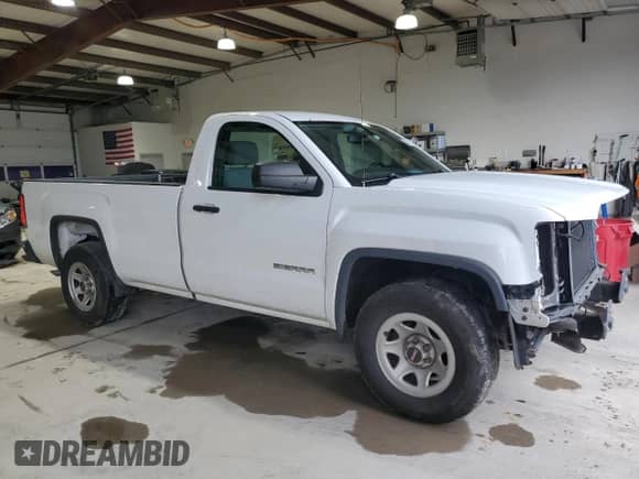 2014 GMC Sierra 1500 with VIN 1GTN1TEHXEZ257513, listed as a Copart auction lot 82128395 with 162,273 mi miles and Salvage title. Bid and sale history available at DreamBid. Image 4.