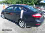 2015 Ford Fiesta SE z VIN 3FADP4BE2FM132430, wystawiony jako IAAI lot #42451462 z przebiegiem 73 501 mil mil oraz . Historia ofert i sprzedaży dostępna na DreamBid. Obrazek 3.