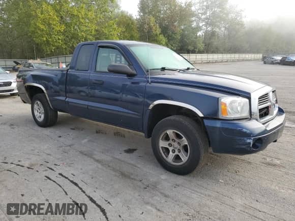 2007 Dodge Dakota SLT с VIN 1D7HW42PX7S138328, выставлен на аукционе Copart как лот 84390095 с пробегом 98 279 миль миль и Списание • Salvage title. История ставок и продаж доступна на DreamBid. Изображение 4.