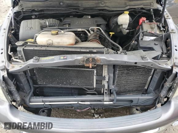 2004 Dodge 1500 SLT z VIN 1D7HU18D54S650866, wystawiony jako Copart lot #90903715 z przebiegiem 150 538 mil mil oraz Czysty tytuł • Clean title. Historia ofert i sprzedaży dostępna na DreamBid. Obrazek 11.