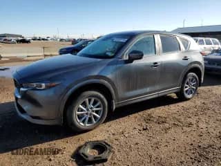 2024 Mazda CX-5 S Select z VIN JM3KFBBL5R0485069, wystawiony jako Copart lot #81237715 z przebiegiem 6 851 mil mil oraz Czysty tytuł • Clean title. Historia ofert i sprzedaży dostępna na DreamBid. Obrazek 1.