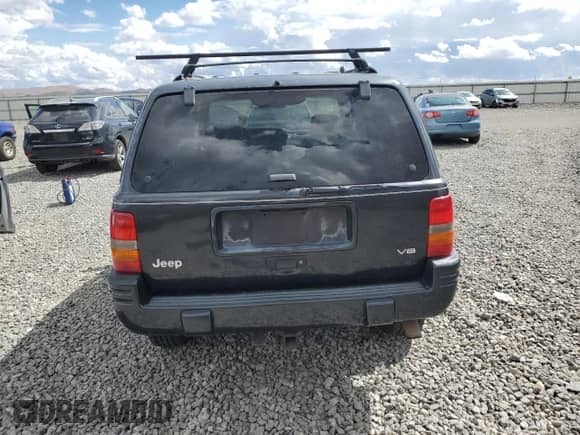1998 Jeep Grand Cherokee Limited с VIN 1J4GZ78Y9WC126821, выставлен на аукционе Copart как лот 80160845 с пробегом 148 911 миль миль и Списание • Salvage title. История ставок и продаж доступна на DreamBid. Изображение 6.