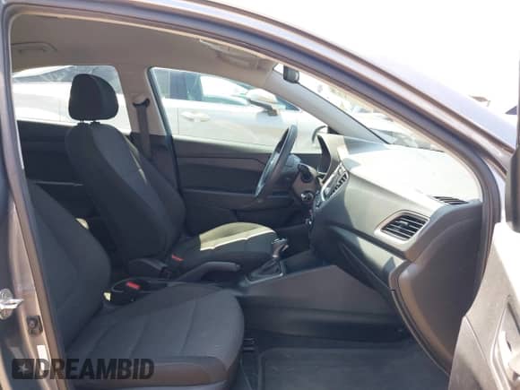 2019 Hyundai Accent SE z VIN 3KPC24A33KE069962, wystawiony jako IAAI lot #43008122 z przebiegiem 128 847 mil mil oraz . Historia ofert i sprzedaży dostępna na DreamBid. Obrazek 5.