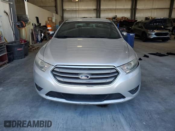2013 Ford Taurus SEL with VIN 1FAHP2E88DG170652, listed as a Copart auction lot 69416615 with 178,959 mi miles and Salvage title. Bid and sale history available at DreamBid. Image 5.