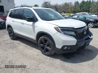 2021 Honda Passport Elite z VIN 5FNYF8H08MB014739, wystawiony jako IAAI lot #42137913 z przebiegiem 50 580 mil mil oraz . Historia ofert i sprzedaży dostępna na DreamBid. Obrazek 1.
