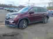 2017 Honda Pilot EX-L with VIN 5FNYF6H74HB040889, listed as a IAAI auction lot 42040094 with 84,001 mi miles and . Bid and sale history available at DreamBid. Image 19.