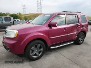 2015 Honda Pilot Touring z VIN 5FNYF4H94FB044184, wystawiony jako Copart lot #70935795 z przebiegiem 115 807 mil mil oraz Szkoda całkowita • Salvage title. Historia ofert i sprzedaży dostępna na DreamBid. Obrazek 1.