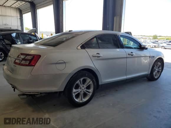 2013 Ford Taurus SEL with VIN 1FAHP2E88DG170652, listed as a Copart auction lot 69416615 with 178,959 mi miles and Salvage title. Bid and sale history available at DreamBid. Image 3.