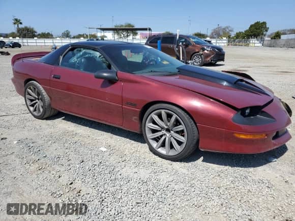 1994 Chevrolet Camaro Z28 with VIN 2G1FP22P4R2160897, listed as a Copart auction lot 50399935 with 86,849 mi miles and Salvage title. Bid and sale history available at DreamBid. Image 4.