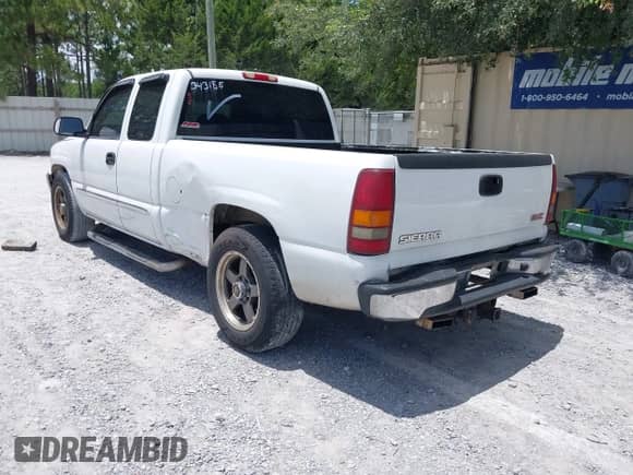 2003 GMC Sierra 1500 SLE with VIN 2GTEC19T731343185, listed as a IAAI auction lot 42680776 with 304,039 mi miles and . Bid and sale history available at DreamBid. Image 3.