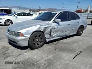 2002 BMW 5 Series 525i с VIN WBADT43412GZ97418, выставлен на аукционе Copart как лот 66577005 с пробегом Не указан миль и Списание • Salvage title. История ставок и продаж доступна на DreamBid. Изображение 1.