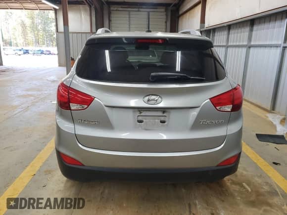 2013 Hyundai Tucson Limited z VIN KM8JU3AC7DU572809, wystawiony jako Copart lot #90926015 z przebiegiem 178 571 mil mil oraz Czysty tytuł • Clean title. Historia ofert i sprzedaży dostępna na DreamBid. Obrazek 6.