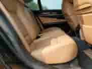 2010 BMW 7 Series 750i xDrive z VIN WBAKC6C51ACL67738, wystawiony jako Copart lot #57118295 z przebiegiem 124 911 mil mil oraz Szkoda całkowita • Salvage title. Historia ofert i sprzedaży dostępna na DreamBid. Obrazek 10.