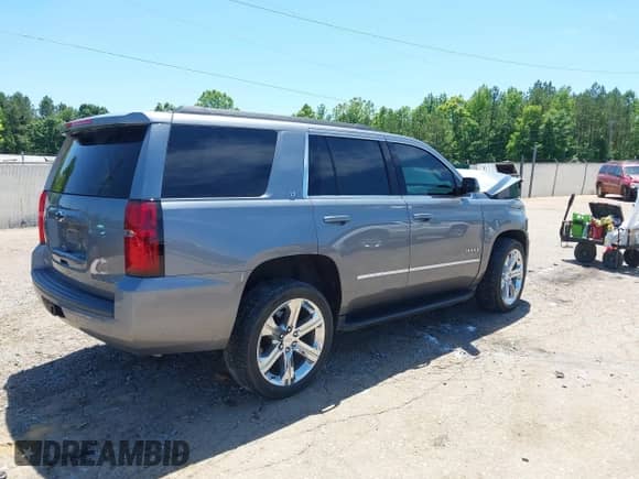 2020 Chevrolet Tahoe LT with VIN 1GNSCBKC3LR204995, listed as a IAAI auction lot 42292566 with 64,874 mi miles and . Bid and sale history available at DreamBid. Image 4.