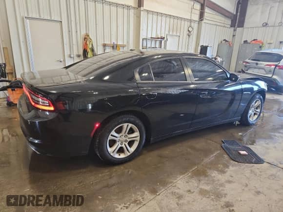 2021 Dodge Charger SXT с VIN 2C3CDXBG0MH636010, выставлен на аукционе Copart как лот 84442535 с пробегом 84 392 миль миль и Списание • Salvage title. История ставок и продаж доступна на DreamBid. Изображение 3.