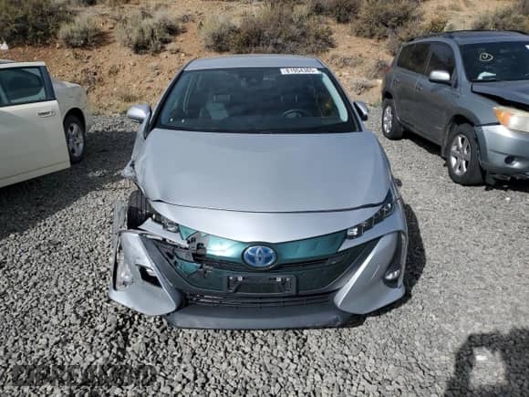 2018 Toyota Prius Plus z VIN JTDKARFP8J3098676, wystawiony jako Copart lot #81954365 z przebiegiem 65 893 mil mil oraz Szkoda całkowita • Salvage title. Historia ofert i sprzedaży dostępna na DreamBid. Obrazek 5.