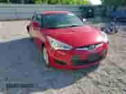 2013 Hyundai Veloster w/Black Int z VIN KMHTC6AD2DU126699, wystawiony jako Copart lot #57329805 z przebiegiem 85 303 mil mil oraz Szkoda całkowita • Salvage title. Historia ofert i sprzedaży dostępna na DreamBid. Obrazek 13.