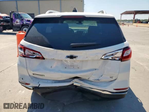 2020 Chevrolet Equinox LT с VIN 3GNAXKEVXLS735427, выставлен на аукционе Copart как лот 80111135 с пробегом 83 405 миль миль и Списание • Salvage title. История ставок и продаж доступна на DreamBid. Изображение 6.