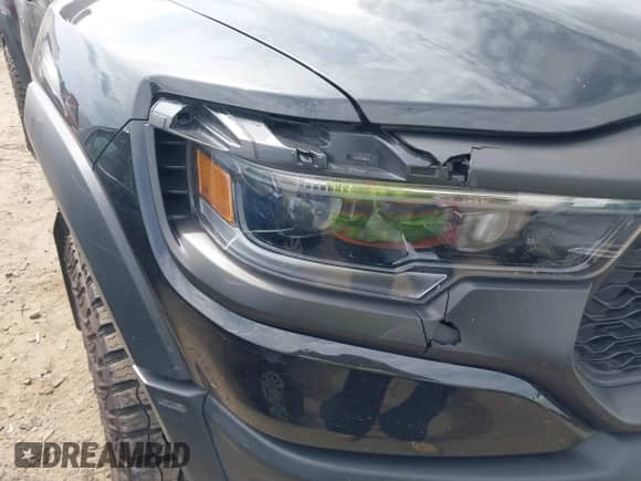 2022 Ram 1500 TRX with VIN 1C6SRFU97NN112337, listed as a IAAI auction lot 42210305 with 47,322 mi miles and . Bid and sale history available at DreamBid. Image 21.