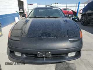 1991 Dodge Stealth with VIN JB3XE74C5MY012599, listed as a Copart auction lot 68479364 with 125,837 mi miles and Salvage title. Bid and sale history available at DreamBid. Image 5.