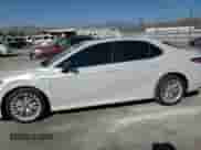 2019 Toyota Camry Hybrid LE с VIN 4T1B21HK2KU512669, выставлен на аукционе Copart как лот 67447715 с пробегом 141 772 миль миль и Списание • Salvage title. История ставок и продаж доступна на DreamBid. Изображение 13.