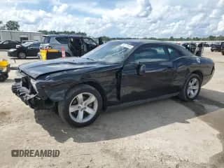 2014 Dodge Challenger SXT z VIN 2C3CDYAG7EH176725, wystawiony jako Copart lot #68176945 z przebiegiem 164 549 mil mil oraz Szkoda całkowita • Salvage title. Historia ofert i sprzedaży dostępna na DreamBid. Obrazek 1.