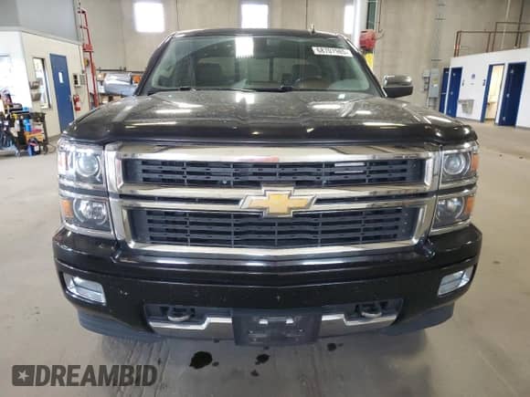 2014 Chevrolet Silverado 1500 High Country с VIN 3GCUKTEJ6EG480448, выставлен на аукционе Copart как лот 68707985 с пробегом 186 075 миль миль и Списание • Salvage title. История ставок и продаж доступна на DreamBid. Изображение 5.