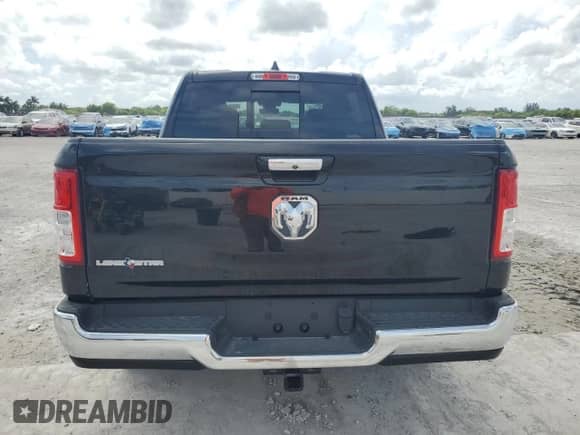 2020 Ram 1500 Big Horn z VIN 1C6RREFG2LN405483, wystawiony jako Copart lot #64309925 z przebiegiem 6 587 mil mil oraz Szkoda całkowita • Salvage title. Historia ofert i sprzedaży dostępna na DreamBid. Obrazek 6.