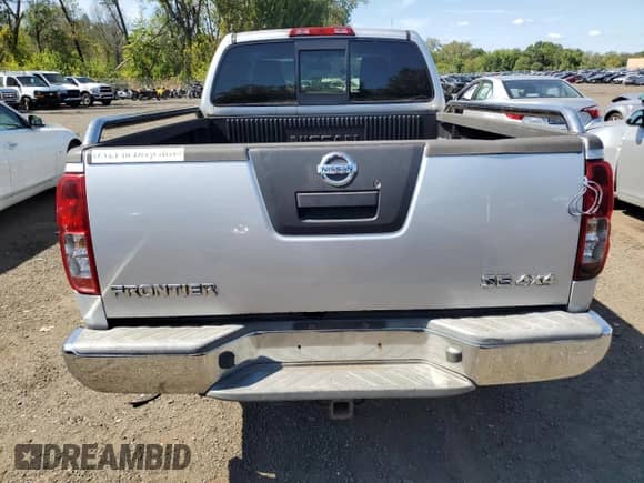 2010 Nissan Frontier SE with VIN 1N6AD0CW3AC441174, listed as a Copart auction lot 71953725 with 121,734 mi miles and Salvage title. Bid and sale history available at DreamBid. Image 6.