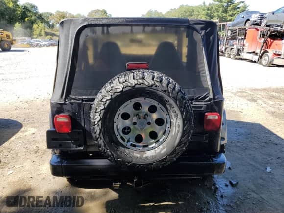 2000 Jeep Wrangler SE with VIN 1J4FA29P8YP784721, listed as a Copart auction lot 82079075 with 157,084 mi miles and Clean title. Bid and sale history available at DreamBid. Image 6.