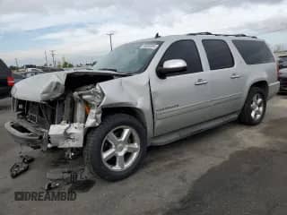 2010 Chevrolet Suburban LTZ с VIN 1GNUCKE07AR197122, выставлен на аукционе Copart как лот 86930304 с пробегом 211 671 миль миль и Списание • Salvage title. История ставок и продаж доступна на DreamBid. Изображение 1.
