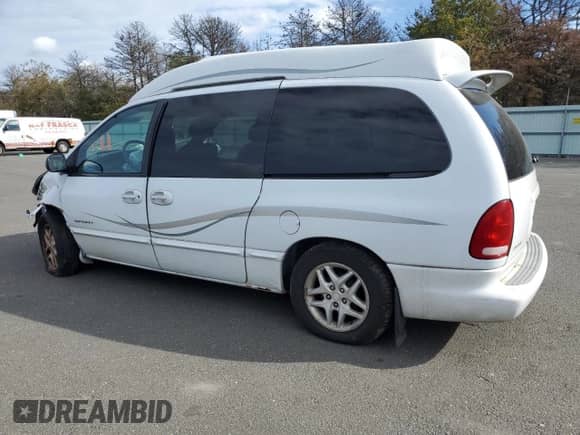 2000 Dodge Caravan SE with VIN 1B4GP44L8YB797844, listed as a Copart auction lot 72460724 with 184,841 mi miles and Salvage title. Bid and sale history available at DreamBid. Image 2.