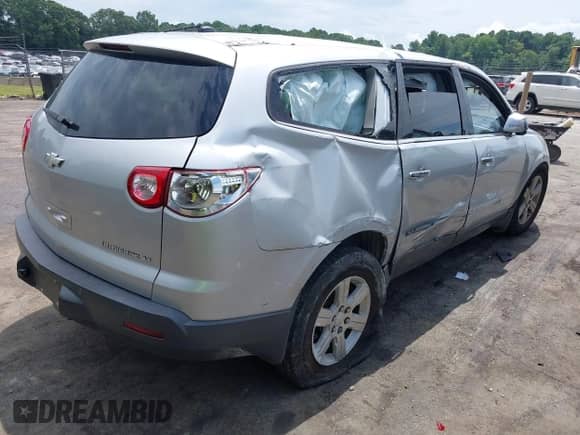 2011 Chevrolet Traverse 2LT with VIN 1GNKRJED2BJ219160, listed as a IAAI auction lot 42879587 with 158,404 mi miles and . Bid and sale history available at DreamBid. Image 4.