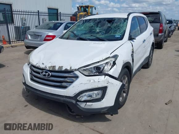 2016 Hyundai Santa Fe with VIN 5XYZU3LB4GG354845, listed as a IAAI auction lot 42512244 with 85,581 mi miles and . Bid and sale history available at DreamBid. Image 2.
