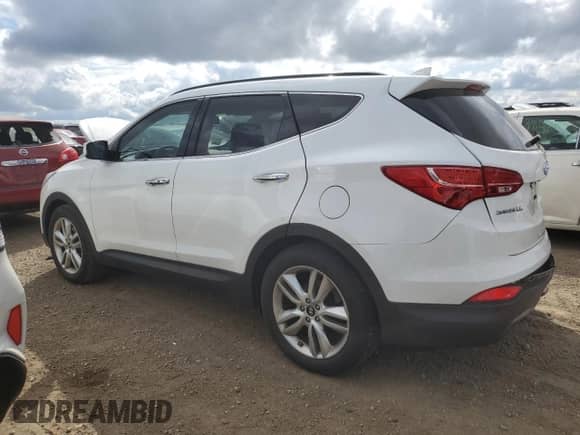 2015 Hyundai Santa Fe с VIN 5XYZWDLAXFG254951, выставлен на аукционе Copart как лот 72043145 с пробегом 102 181 миль миль и Списание • Salvage title. История ставок и продаж доступна на DreamBid. Изображение 2.