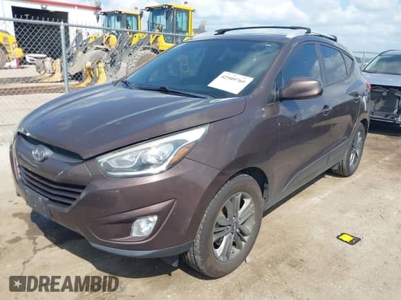 2014 Hyundai Tucson Limited with VIN KM8JUCAG7EU888876, listed as a IAAI auction lot 42509769 with 143,811 mi miles and . Bid and sale history available at DreamBid. Image 2.