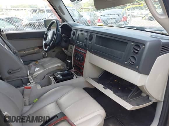 2007 Jeep Commander Limited z VIN 1J8HG58207C591661, wystawiony jako IAAI lot #42795147 z przebiegiem Nie podano mil oraz . Historia ofert i sprzedaży dostępna na DreamBid. Obrazek 5.