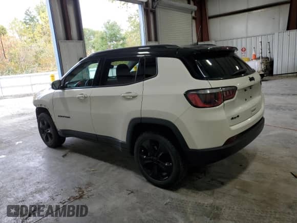 2019 Jeep Compass Latitude with VIN 3C4NJDBB7KT733970, listed as a Copart auction lot 87241235 with 72,963 mi miles and Salvage title. Bid and sale history available at DreamBid. Image 2.
