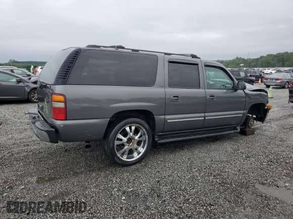 2002 Chevrolet Suburban LT z VIN 1GNFK16Z32J154139, wystawiony jako Copart lot #67752995 z przebiegiem 348 650 mil mil oraz Szkoda całkowita • Salvage title. Historia ofert i sprzedaży dostępna na DreamBid. Obrazek 3.