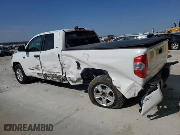 2021 Toyota Tundra SR5 z VIN 5TFUY5F12MX044652, wystawiony jako Copart lot #85121455 z przebiegiem 60 761 mil mil oraz Szkoda całkowita • Salvage title. Historia ofert i sprzedaży dostępna na DreamBid. Obrazek 2.