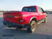 2018 Ram 1500 Rebel with VIN 1C6RR7YT8JS178952, listed as a IAAI auction lot 40514135 with 122,955 mi miles and . Bid and sale history available at DreamBid. Image 4.