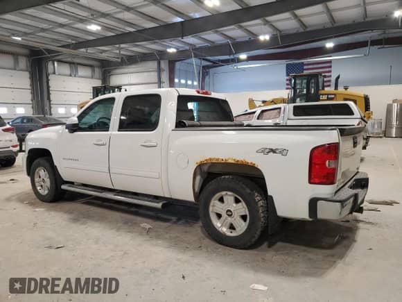 2013 Chevrolet Silverado 1500 LTZ с VIN 3GCPKTE24DG204077, выставлен на аукционе Copart как лот 87686625 с пробегом 214 161 миль миль и Списание • Salvage title. История ставок и продаж доступна на DreamBid. Изображение 2.