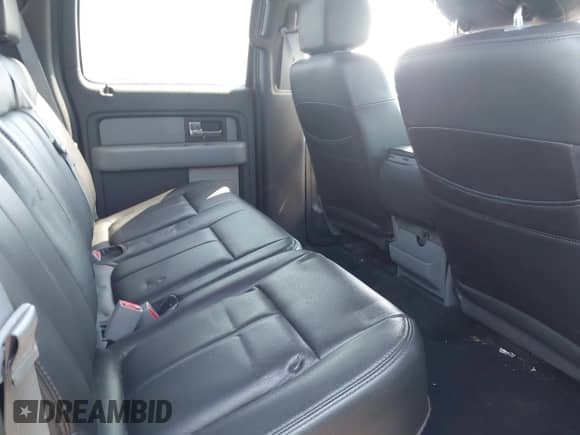 2013 Ford F-150 Lariat with VIN 1FTFW1ET5DKD59128, listed as a IAAI auction lot 43185916 with 135,162 mi miles and . Bid and sale history available at DreamBid. Image 8.