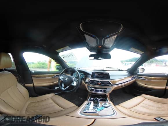 2016 BMW 7 Series 750i xDrive with VIN WBA7F2C58GG415114, listed as a IAAI auction lot 42627693 with 87,908 mi miles and . Bid and sale history available at DreamBid. Image 19.
