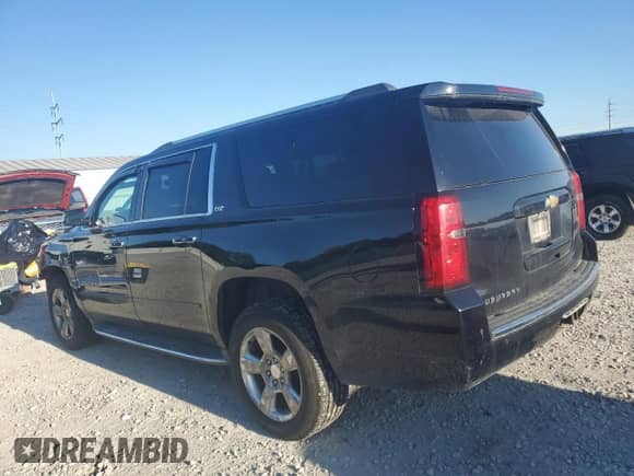 2016 Chevrolet Suburban LTZ with VIN 1GNSKJKC2GR122680, listed as a Copart auction lot 69905945 with 178,902 mi miles and Salvage title. Bid and sale history available at DreamBid. Image 2.