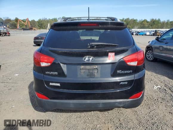 2012 Hyundai Tucson GLS with VIN KM8JUCAC4CU531746, listed as a Copart auction lot 85314435 with 124,696 mi miles and Clean title. Bid and sale history available at DreamBid. Image 6.